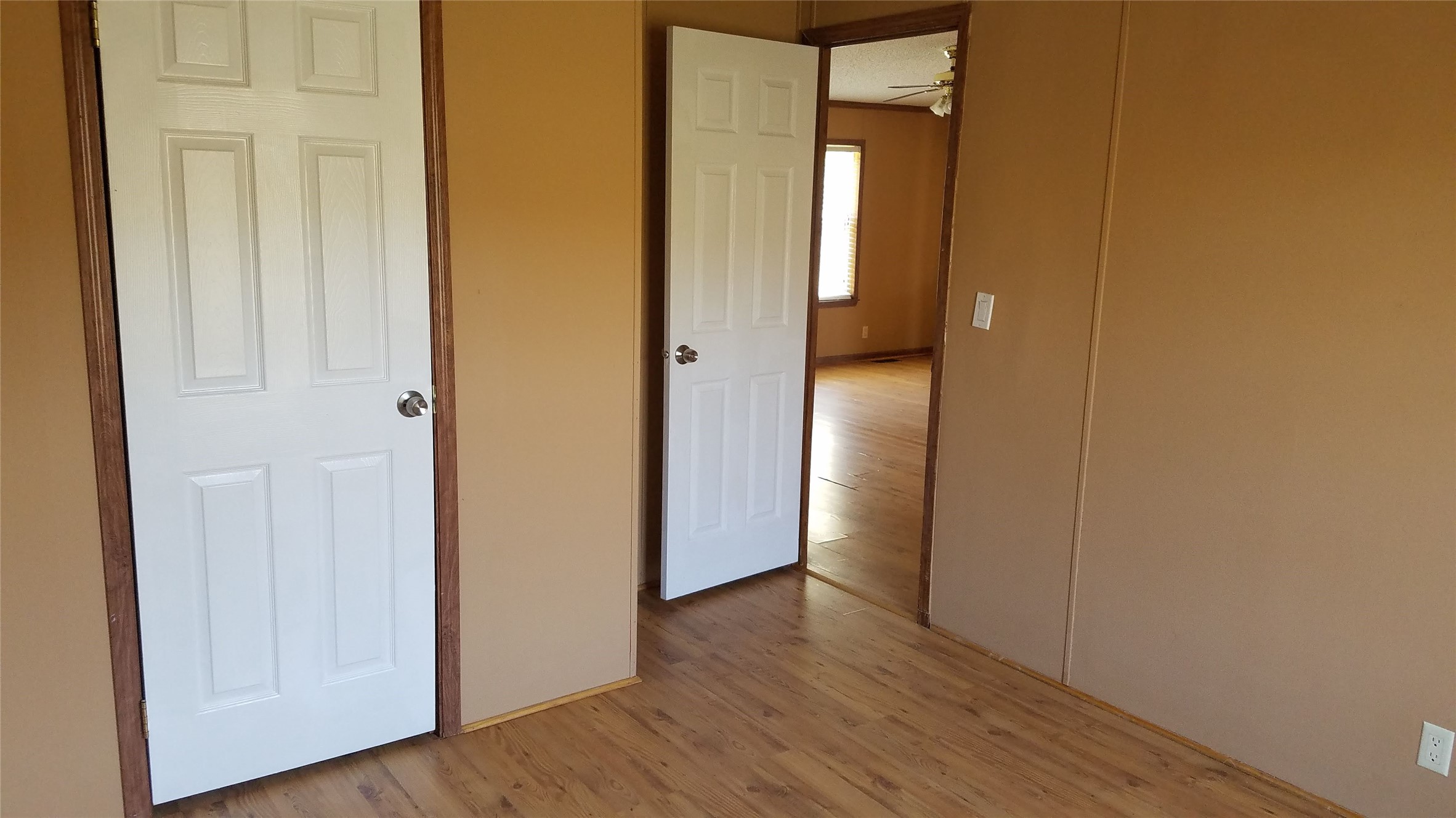 270 Country Way Road Smithville, TX 78957 - Photo 22 of 24 an empty room with wooden floor and closet