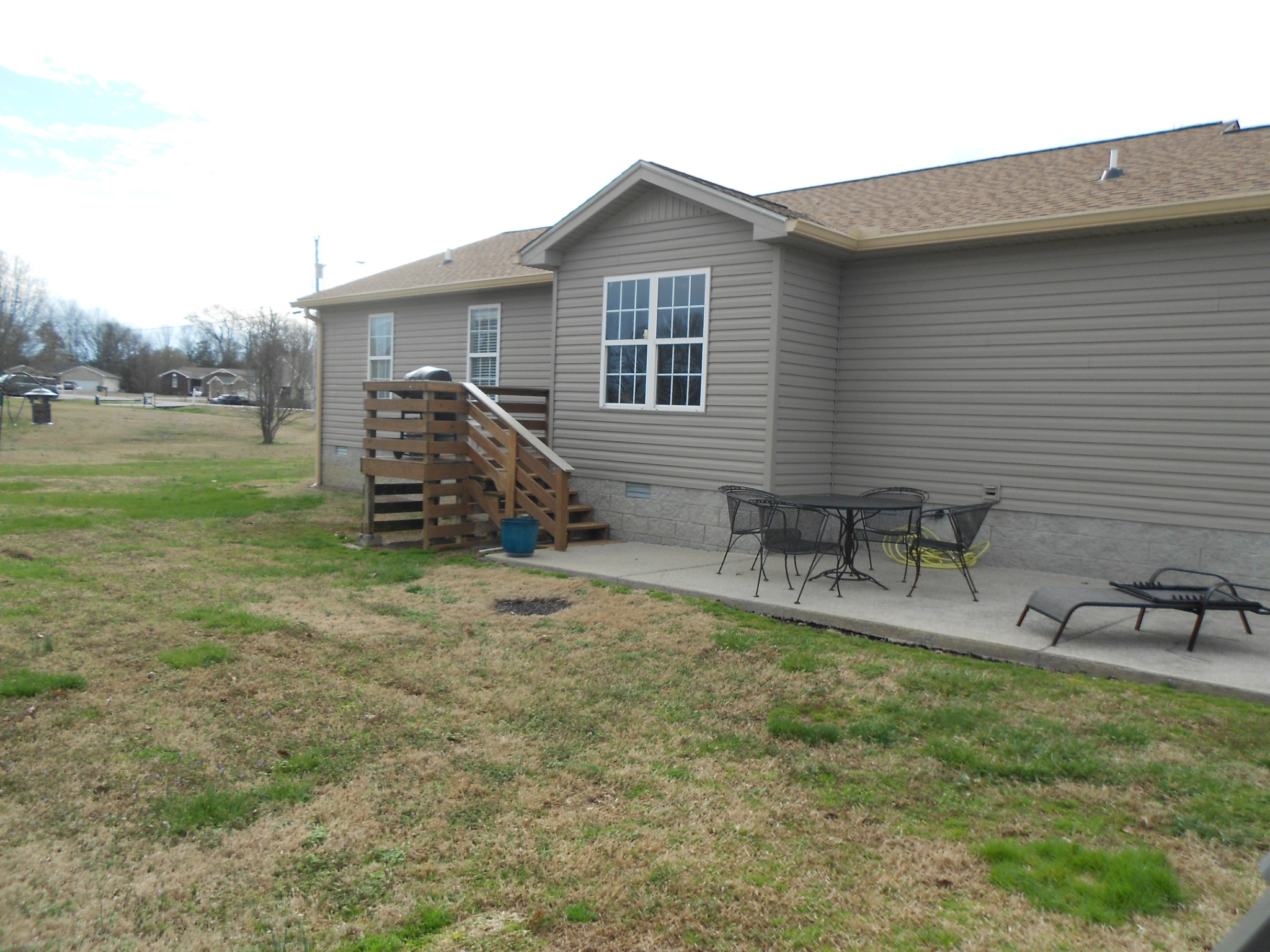 331 Chrissa Lane Lebanon, TN 37087 - Photo 18 of 20 a backyard of a house with table and chairs