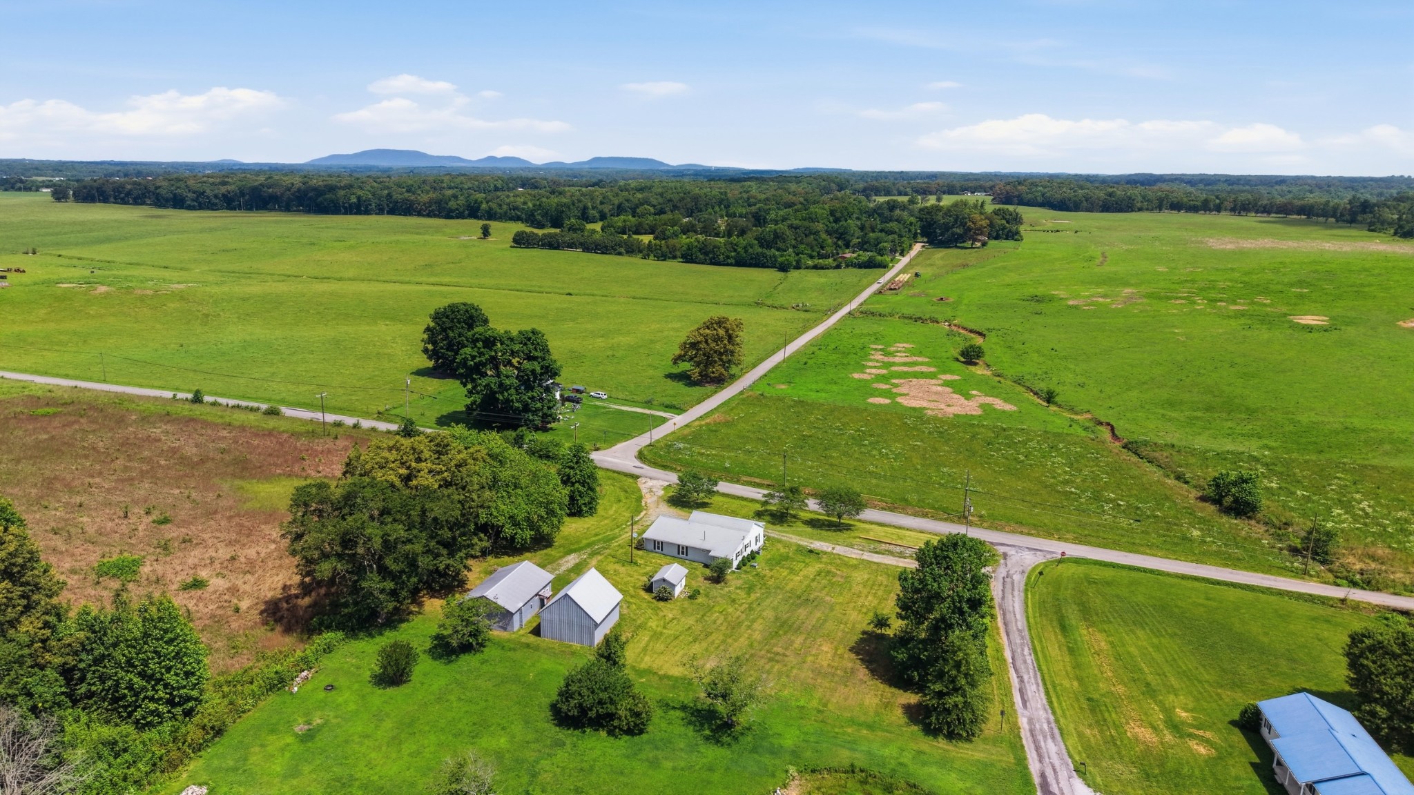 469 Fred Cooper Road McMinnville, TN 37110 - Photo 46 of 46 a view of a lake with a city