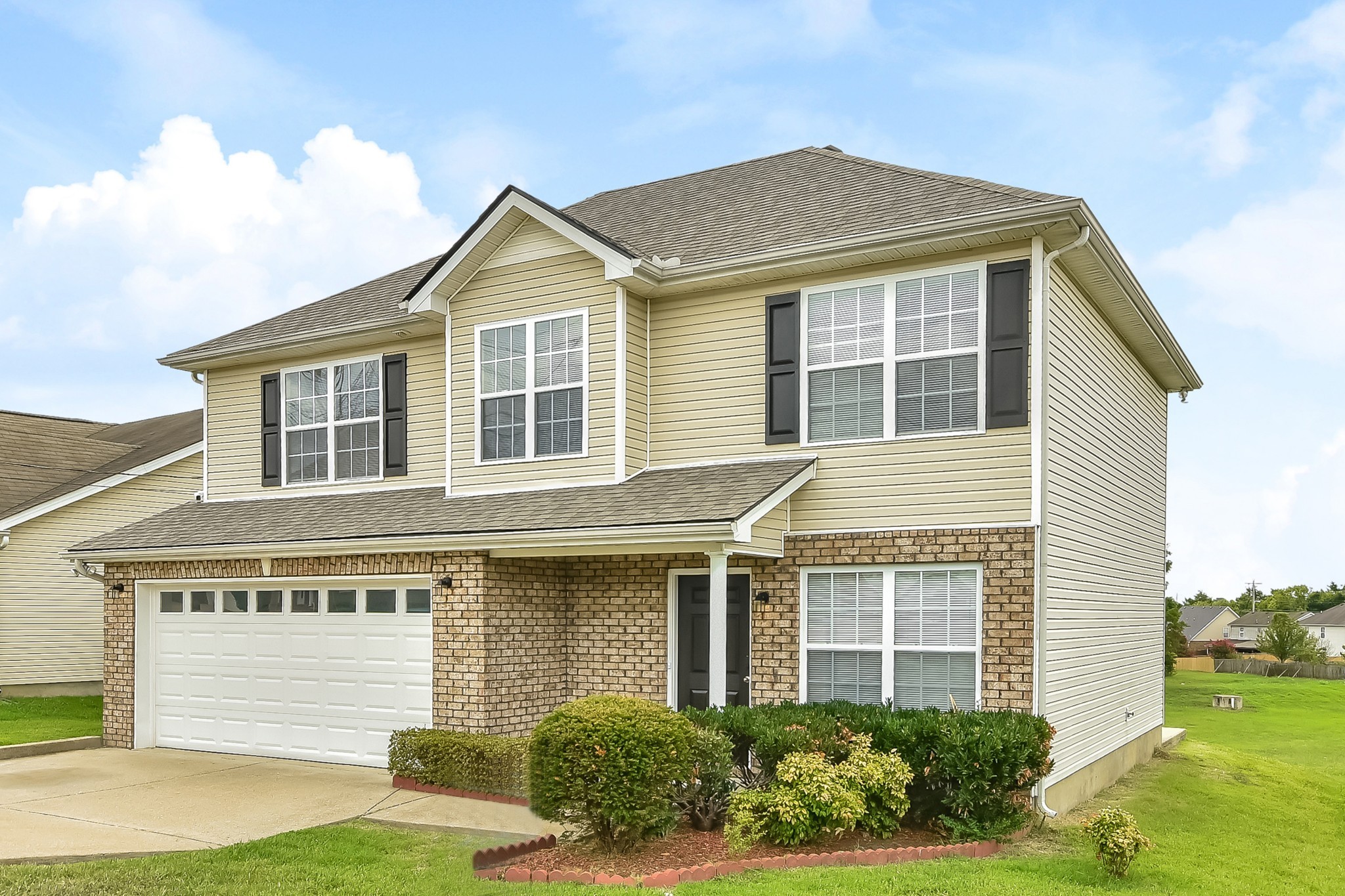 1224 Maritime Port Antioch, TN 37013 - Photo 14 of 17 a front view of a house with garden