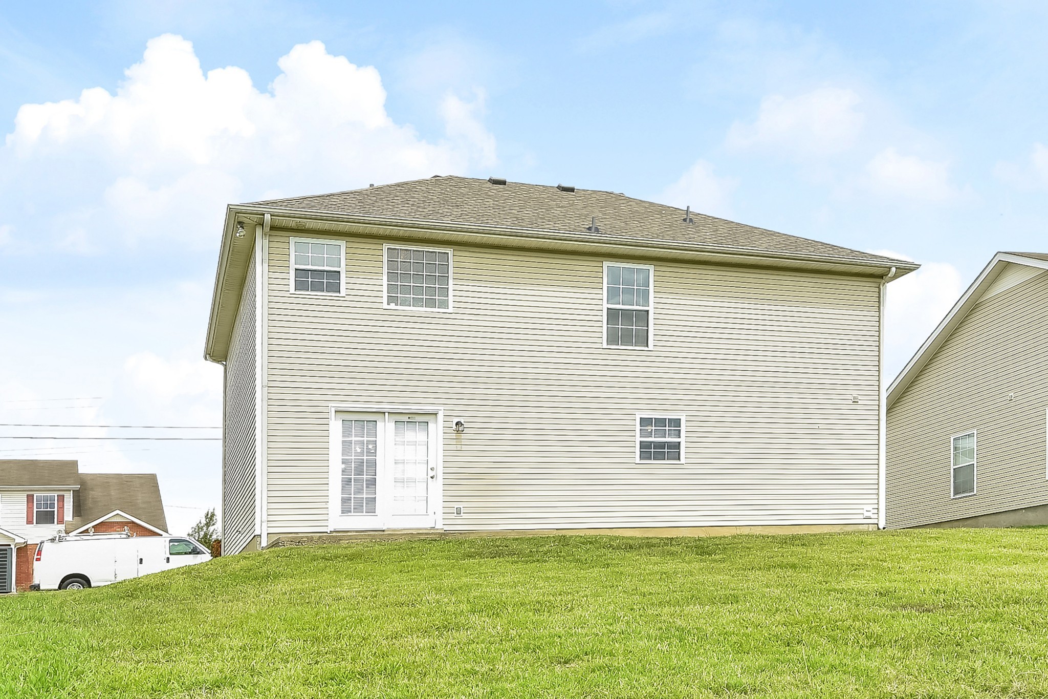 1224 Maritime Port Antioch, TN 37013 - Photo 15 of 17 a front view of a house with a garden and yard