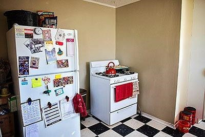 3319 26th Street Lubbock, TX 79410 - Photo 5 of 8 a utility room with storage and utility