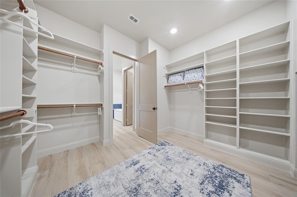 958 Cedar Mills Road Gordonville, TX 76245 - Photo 23 of 40 a view of walk in closet with empty racks
