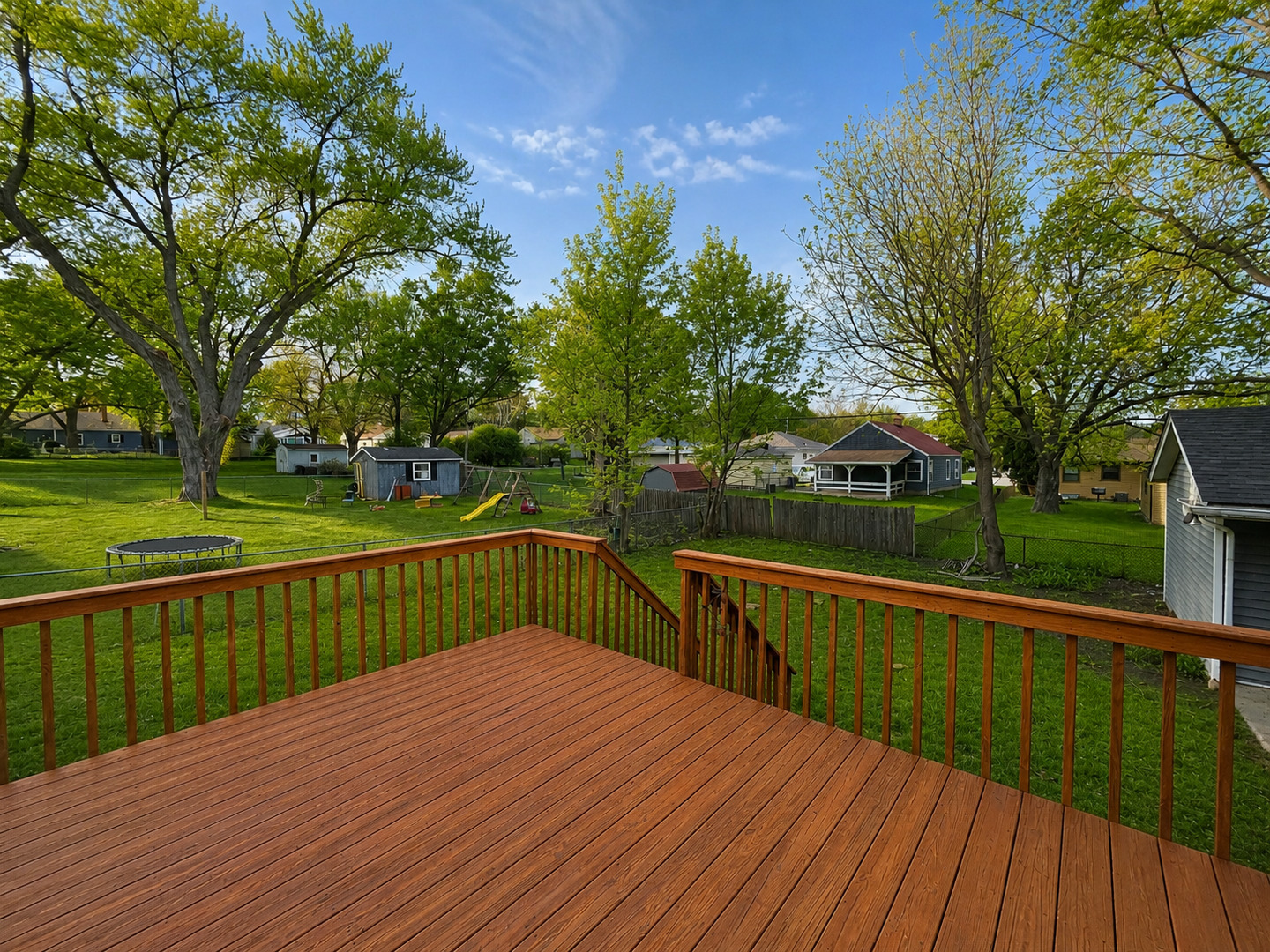 720 Adams Street Elgin, IL 60123 - Photo 15 of 16 a view of deck with wooden floor and fence