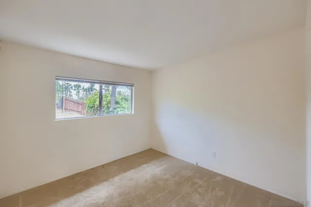 an empty room with a window