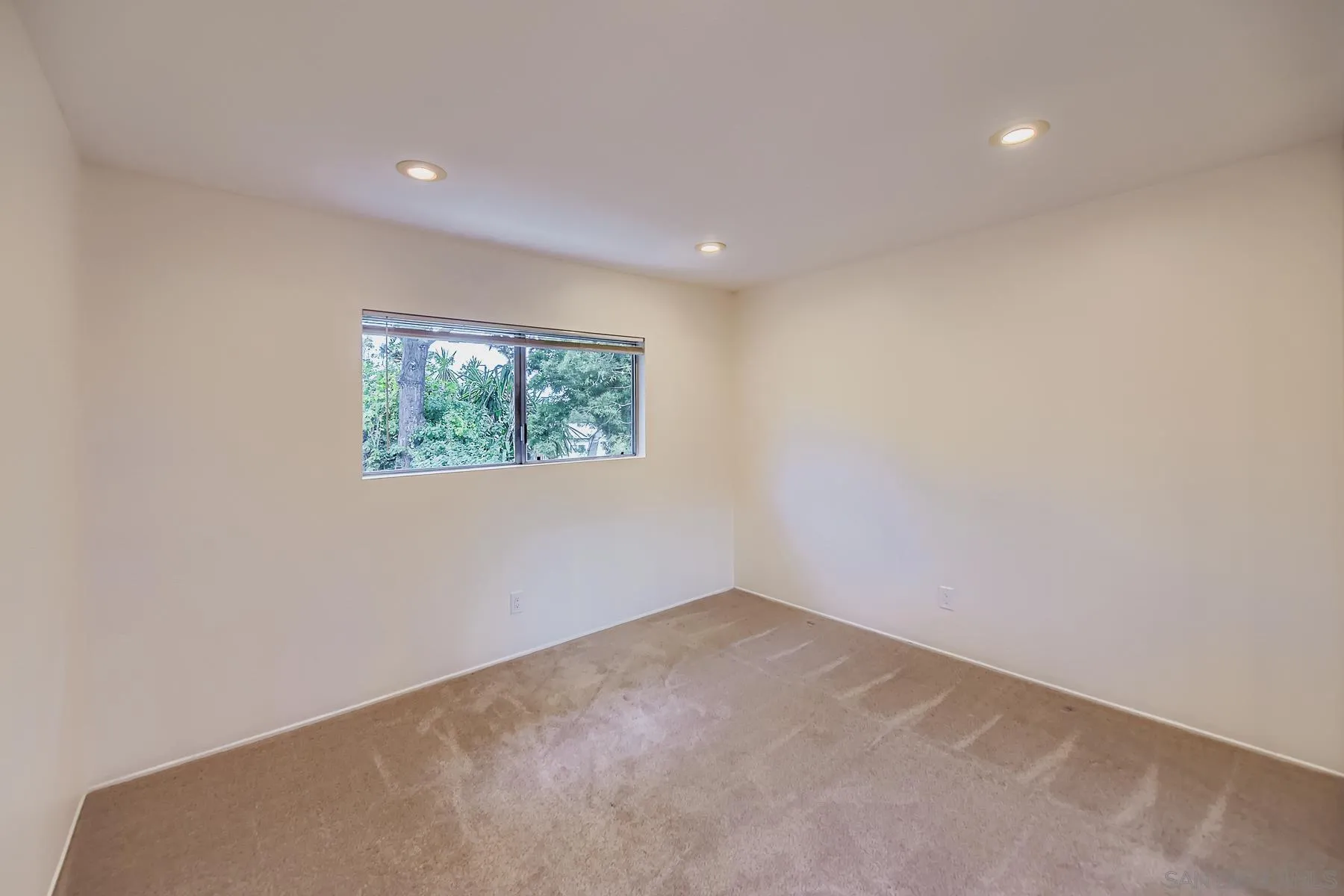 5977 Agee Street San Diego, CA 92122 - Photo 22 of 25 an empty room with a window