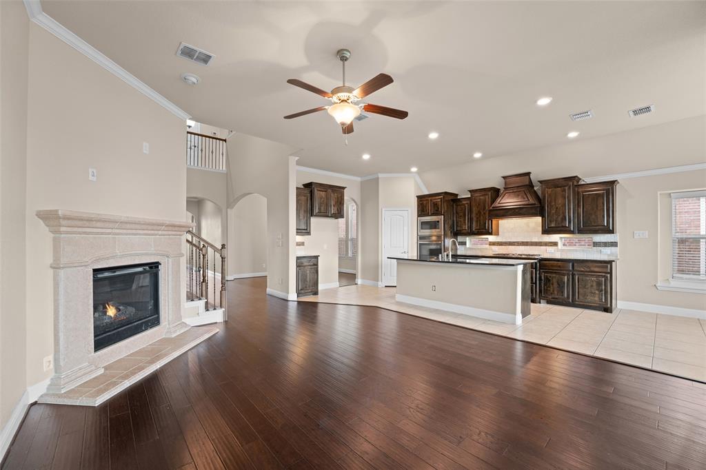 600 Fishback Circle Plano, TX 75074 - Photo 24 of 38 a view of kitchen with sink and wooden floor