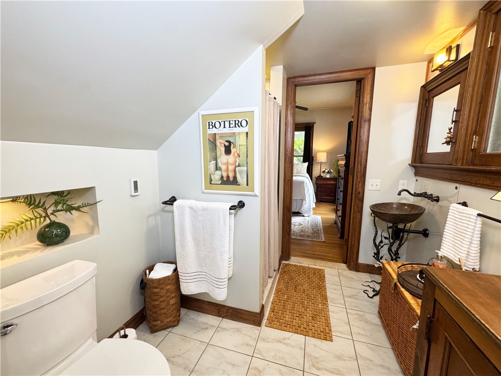 106 Argyle Street Rochester, NY 14607 - Photo 13 of 50 The bathroom jack and jills into the main bedroom.