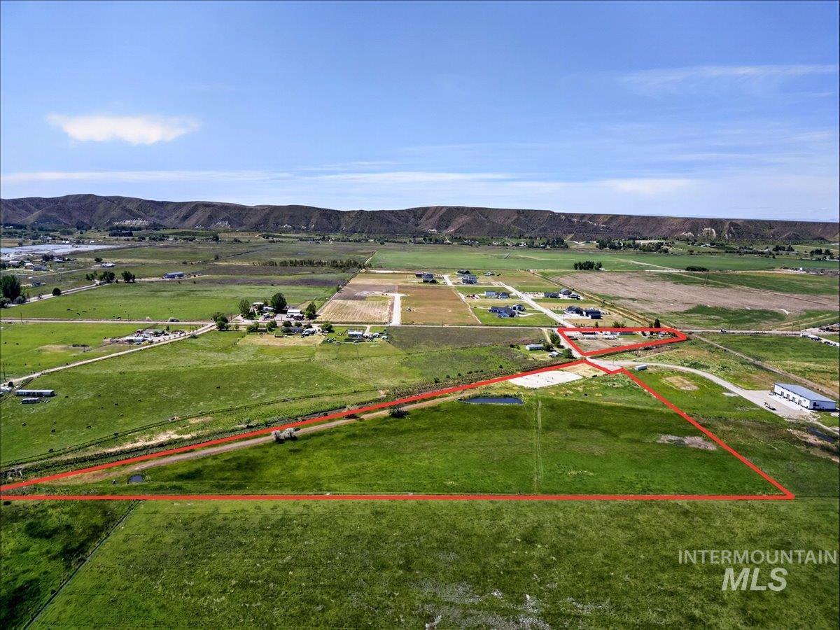 2588 West Sales Yard Road Emmett, ID 83617 - Photo 36 of 49 Expansive green acreage with distant mountain scenery