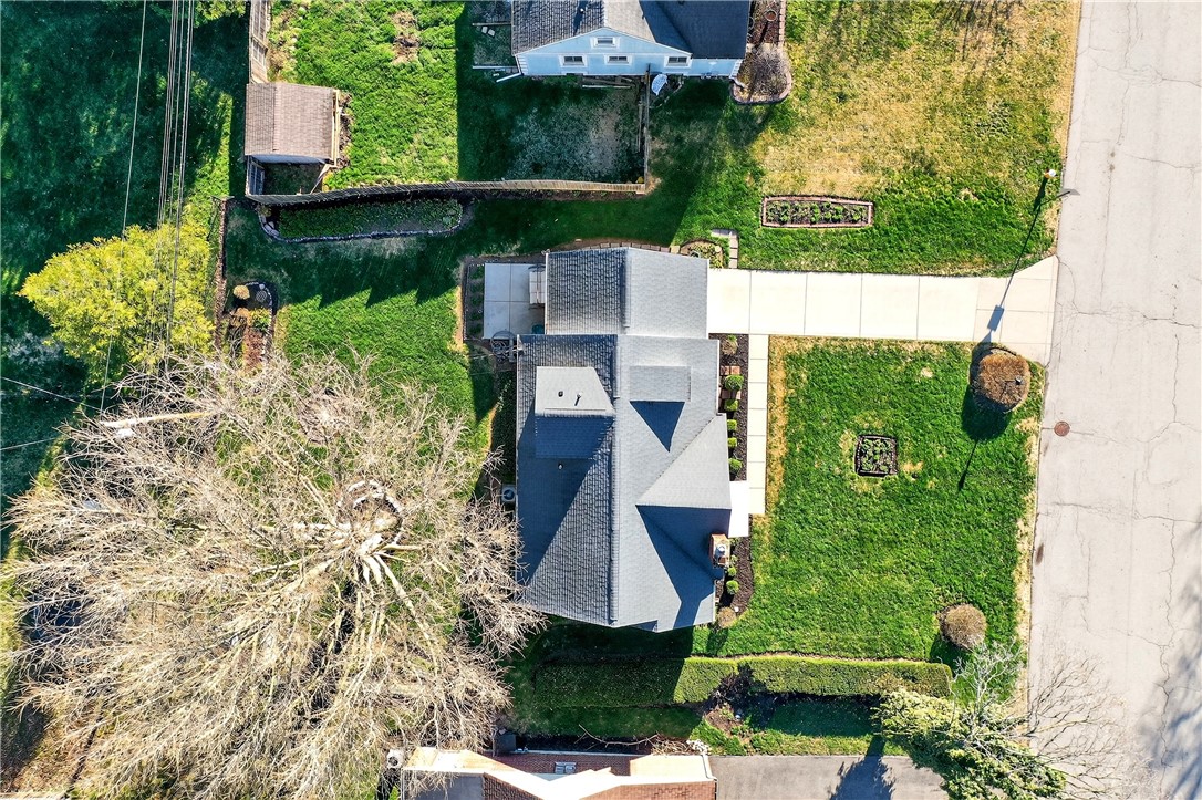 1237 Laurelwood Road Dayton, OH 45409 - Photo 49 of 56 An aerial view showcases a residential property with lush green lawns and established landscaping.