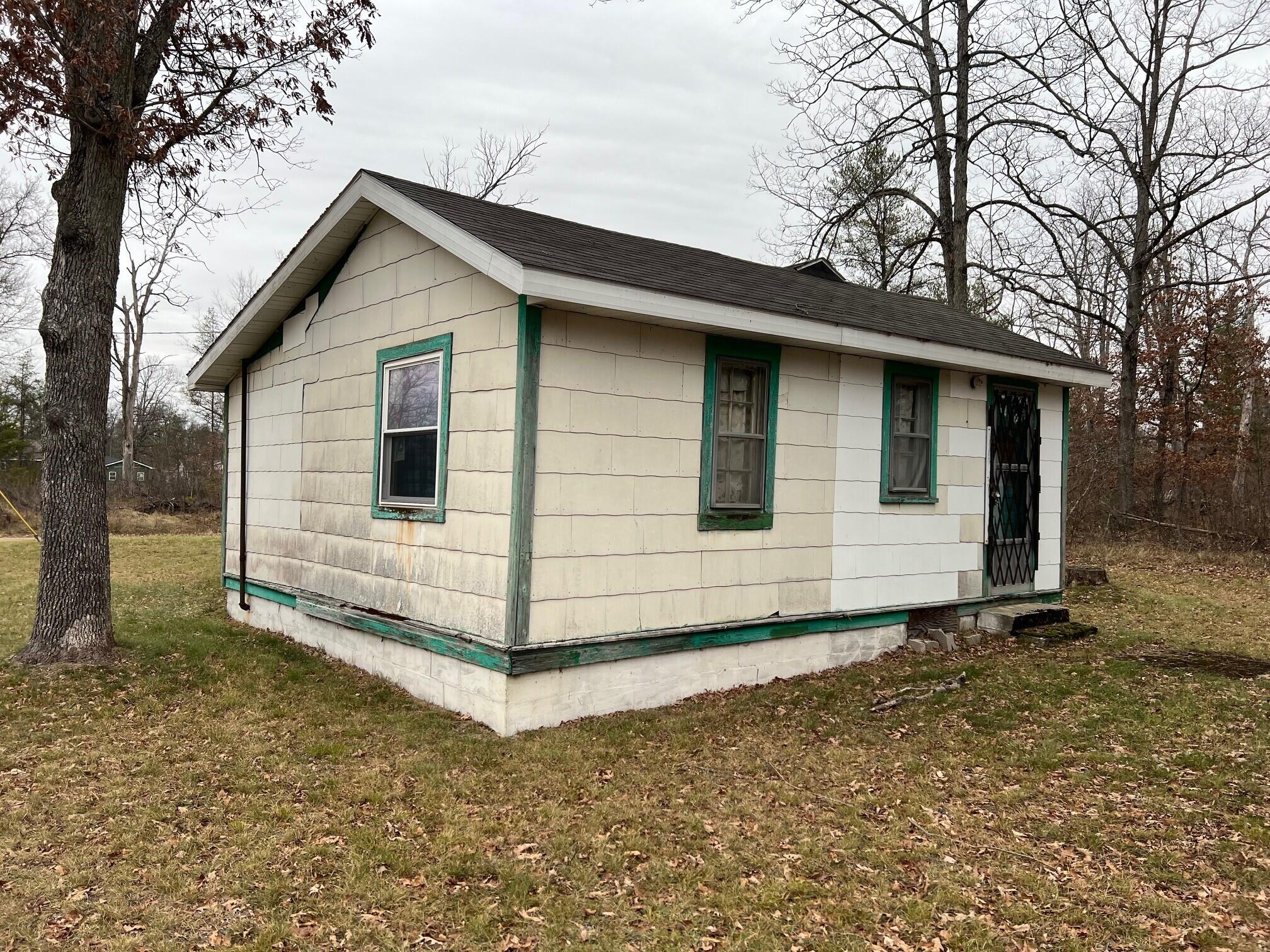 7050 South Forman Road Idlewild, MI 49642 - Photo 1 of 9 Mac Outside Pic