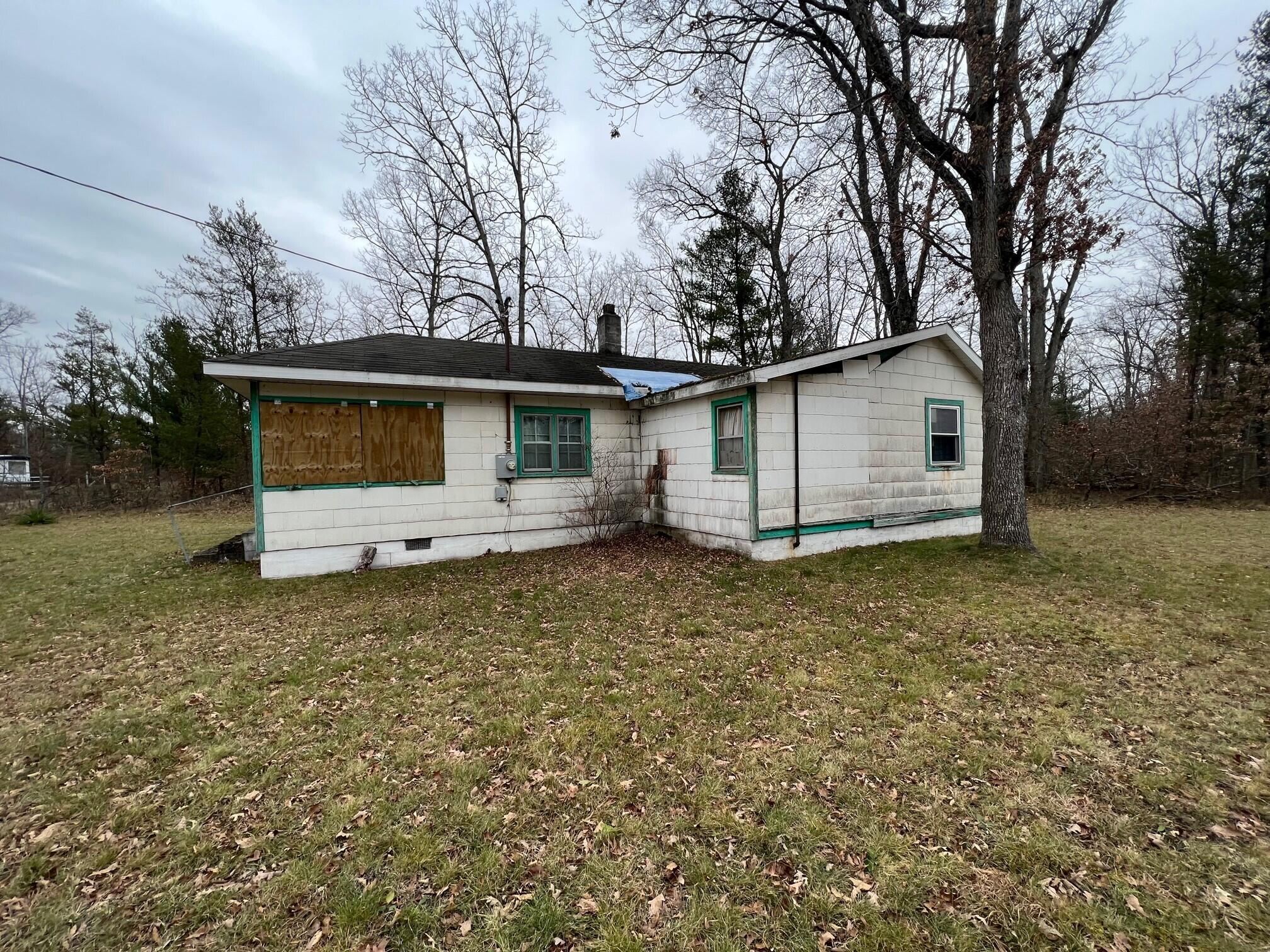 7050 South Forman Road Idlewild, MI 49642 - Photo 2 of 9 Mac Outside Pic 2