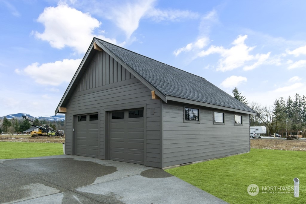 12243 Mundy Loss Road Buckley, WA 98321 - Photo 6 of 40 a view of a house with yard