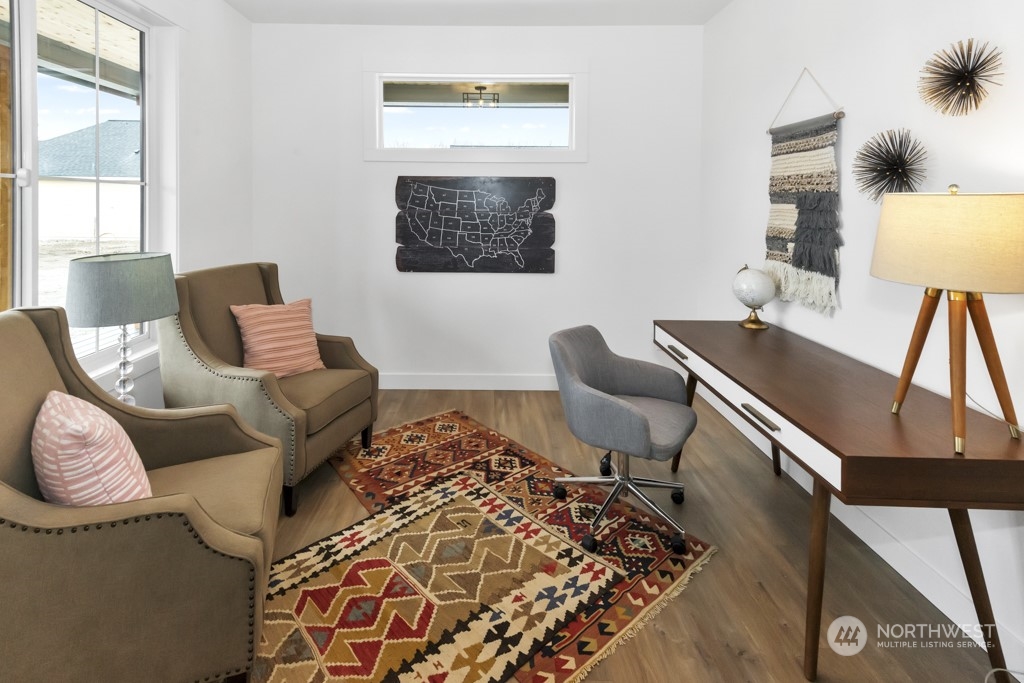 12243 Mundy Loss Road Buckley, WA 98321 - Photo 9 of 40 a living room with furniture and a window
