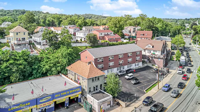 an aerial view of a house with a garden