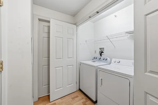 a utility room with dryer and washer