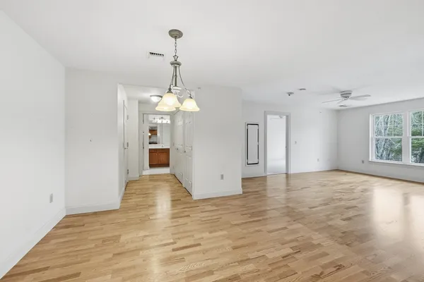 a view of an empty room and window