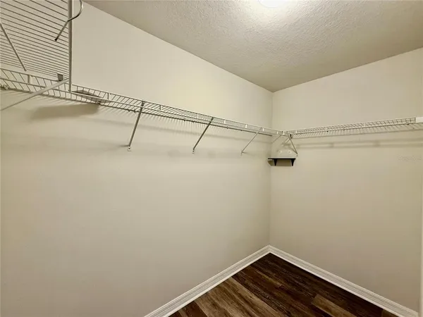 a view of a room with racks on the wall