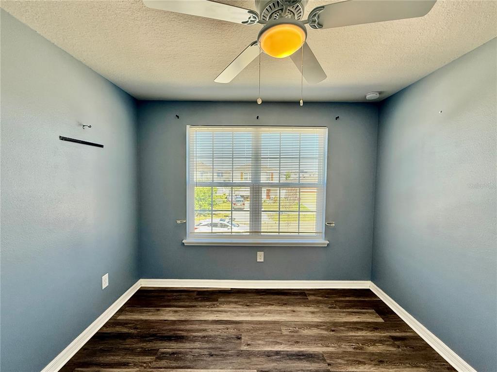14207 Poke Ridge Drive Riverview, FL 33579 - Photo 21 of 34 an empty room with window