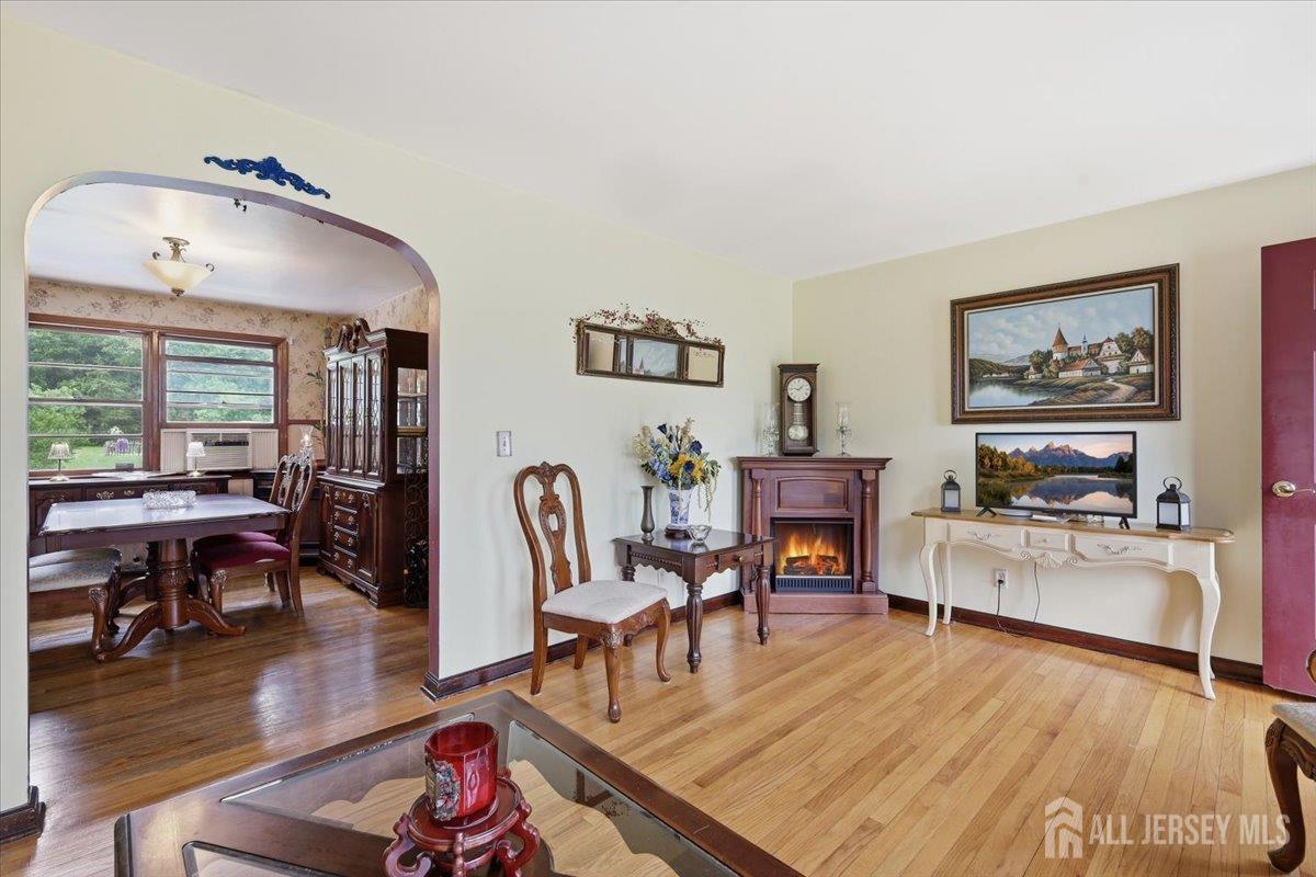 33 Ellison Road Somerset, NJ 08873 - Photo 5 of 38 a living room with furniture and wooden floor