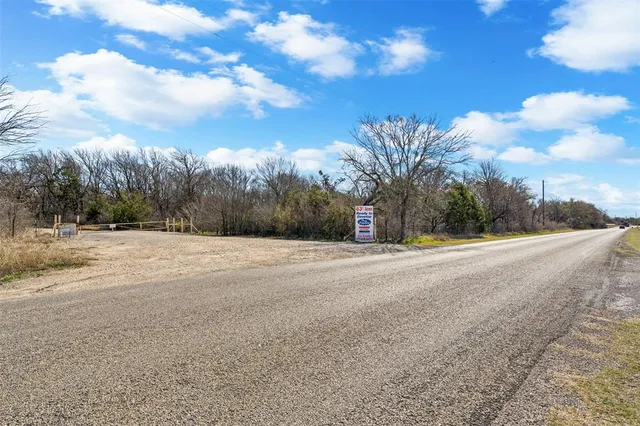 a view of road and trees