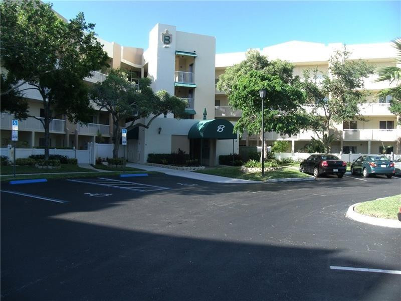 a view of street with parked cars