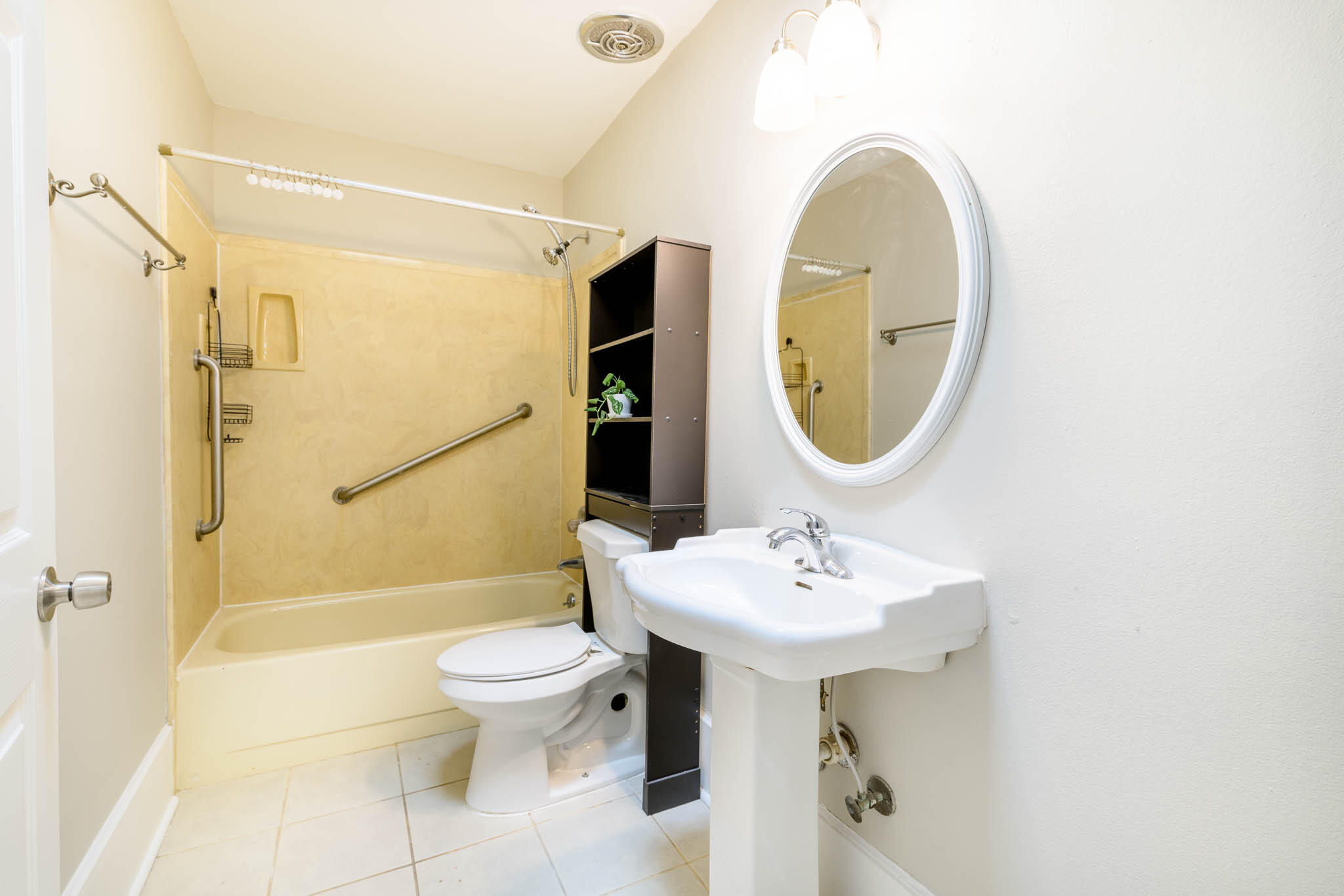 1688 Vine Avenue Niceville, FL 32578 - Photo 27 of 32 a bathroom with a sink toilet and a mirror