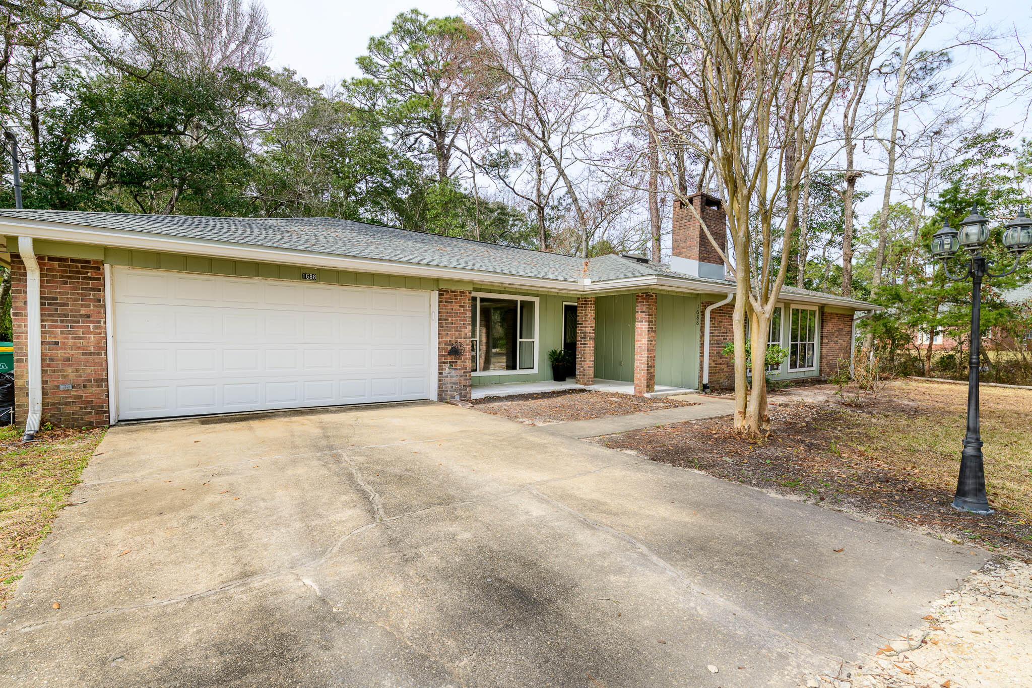 1688 Vine Avenue Niceville, FL 32578 - Photo 4 of 32 outdoor view of a house with a outdoor space
