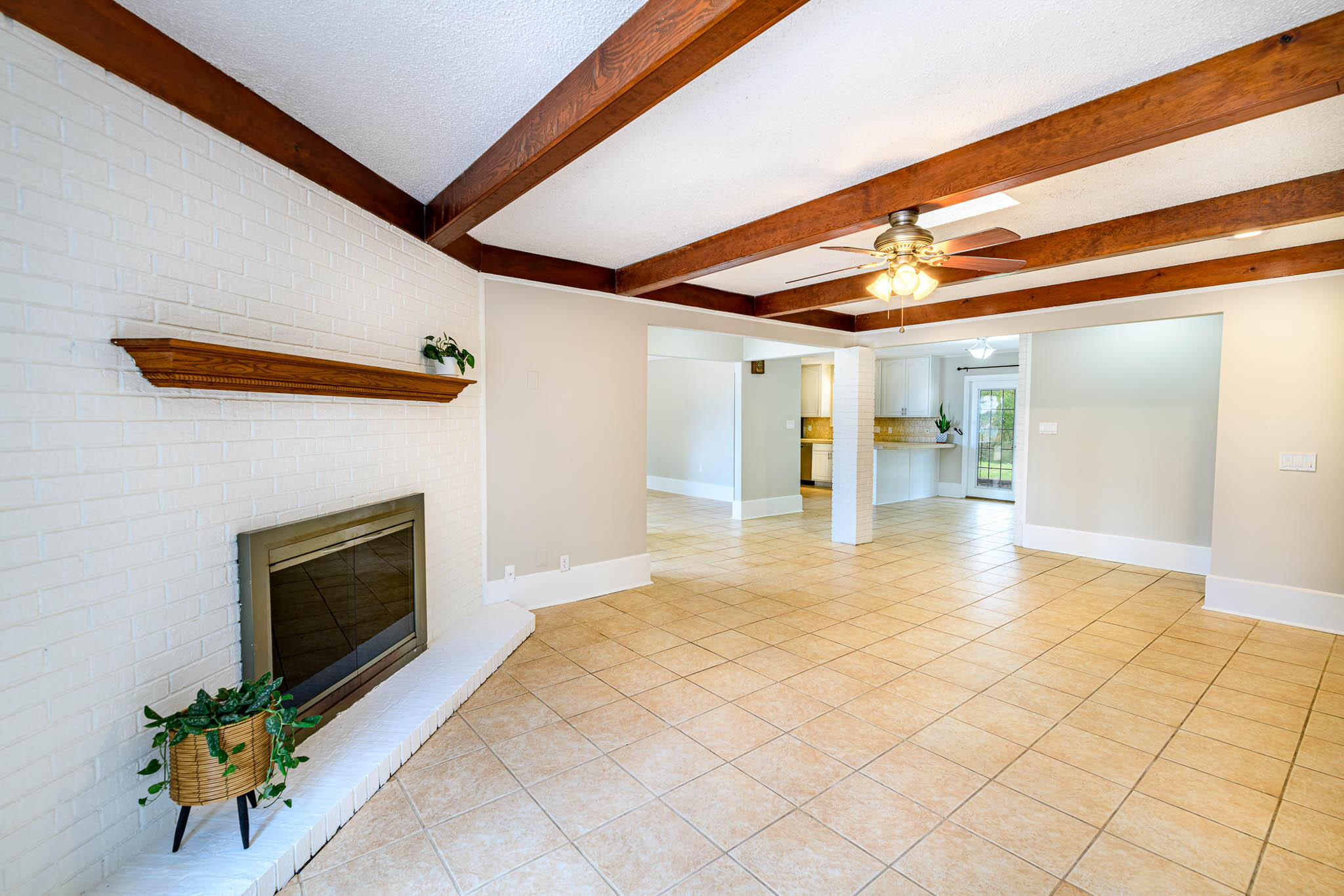 1688 Vine Avenue Niceville, FL 32578 - Photo 10 of 32 a view of an empty room with a fireplace