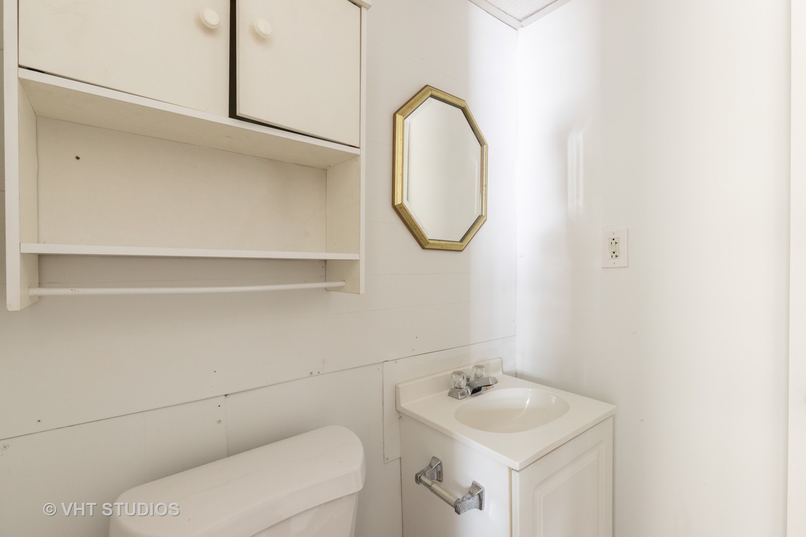 168 Eagle Point Road Fox Lake, IL 60020 - Photo 15 of 25 a bathroom with a sink and a mirror