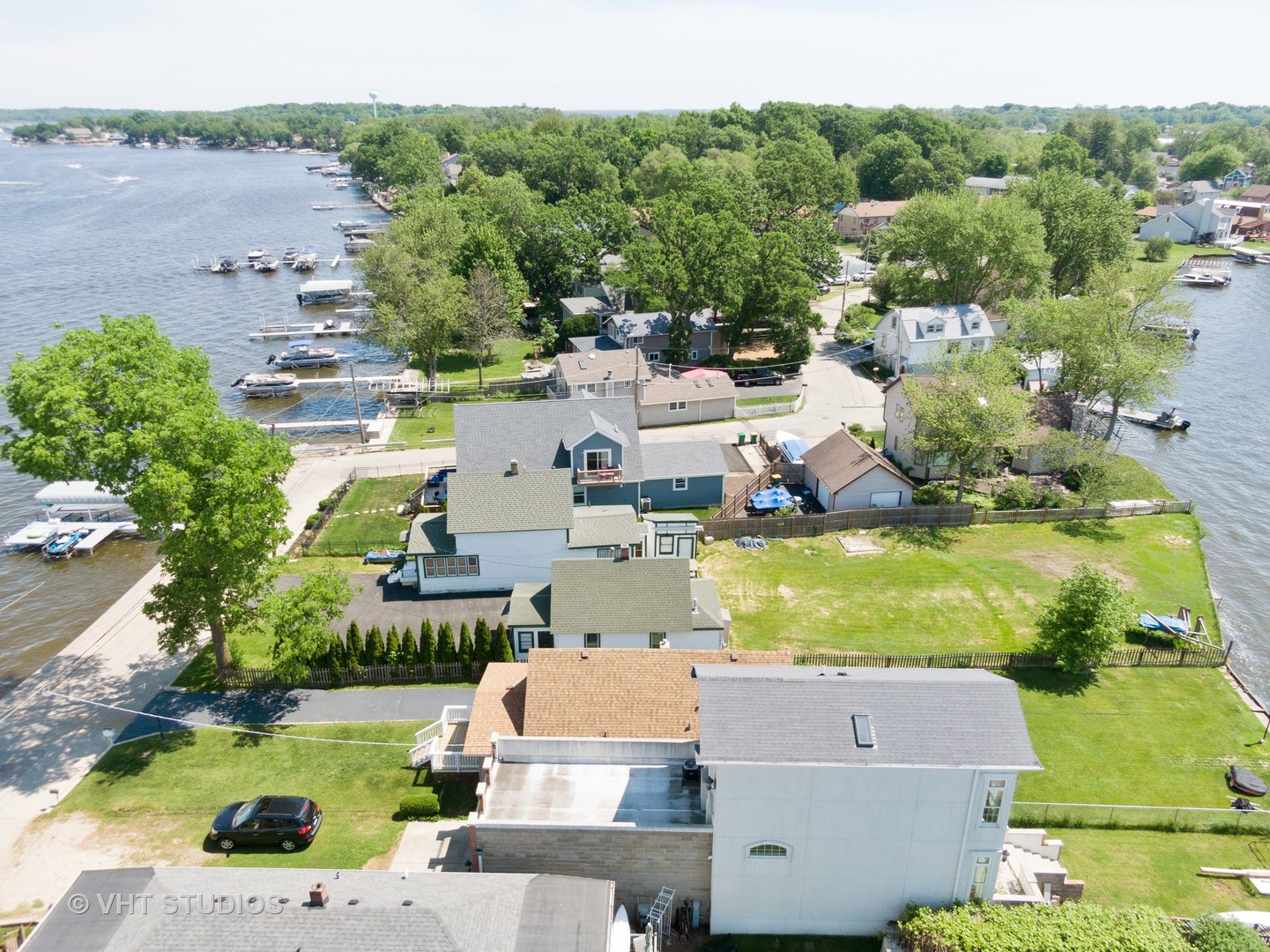 168 Eagle Point Road Fox Lake, IL 60020 - Photo 21 of 25 an aerial view of residential houses with outdoor space and lake view