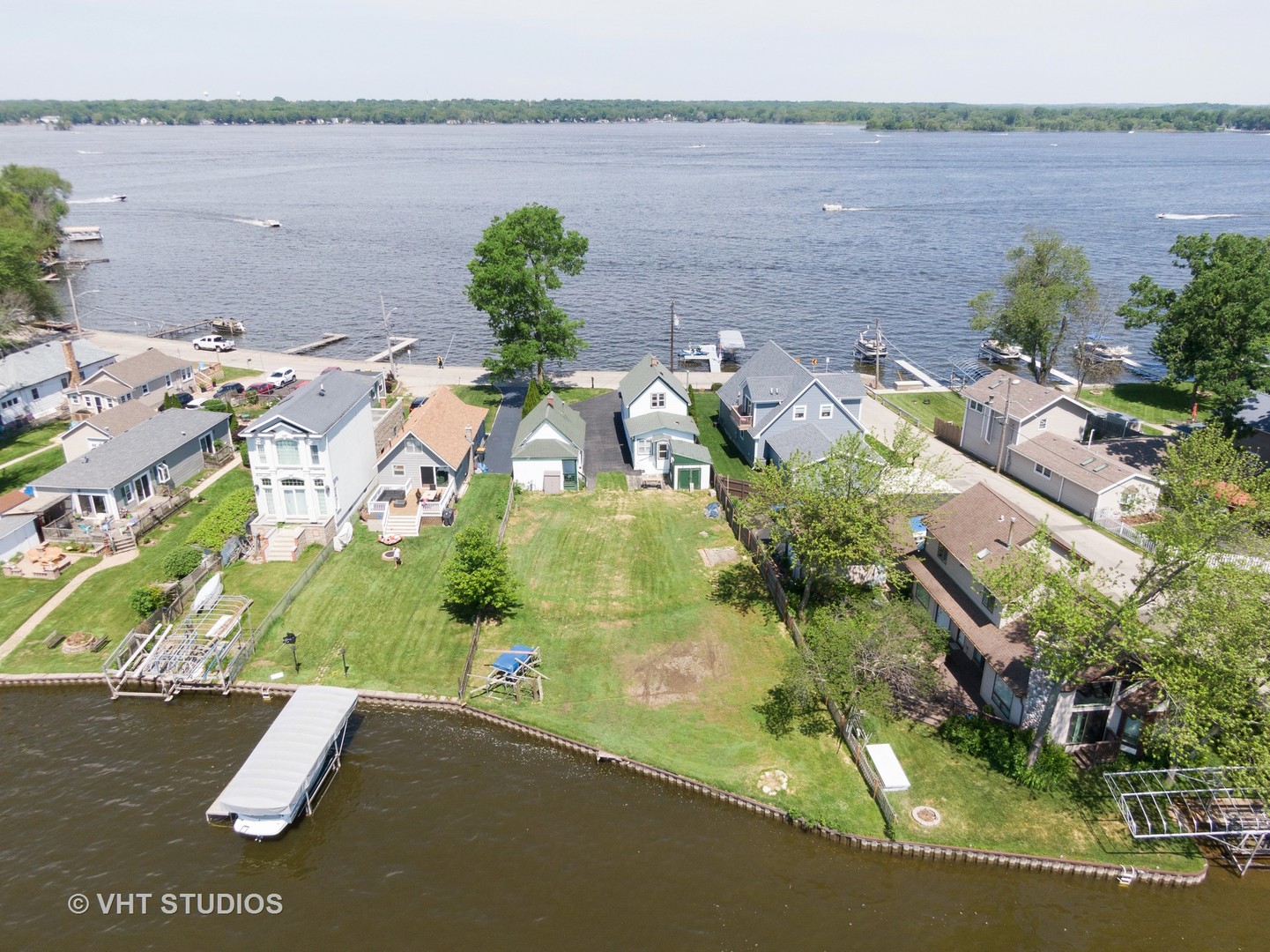 168 Eagle Point Road Fox Lake, IL 60020 - Photo 22 of 25 an aerial view of residential houses with outdoor space