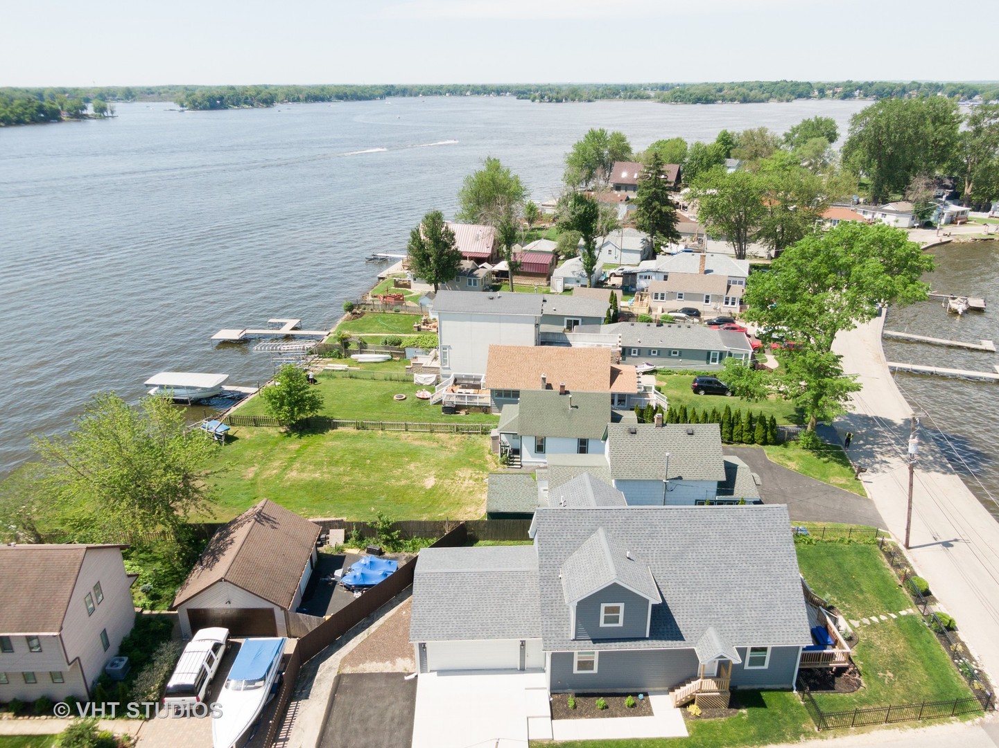 168 Eagle Point Road Fox Lake, IL 60020 - Photo 23 of 25 a view of houses with outdoor space and lake view