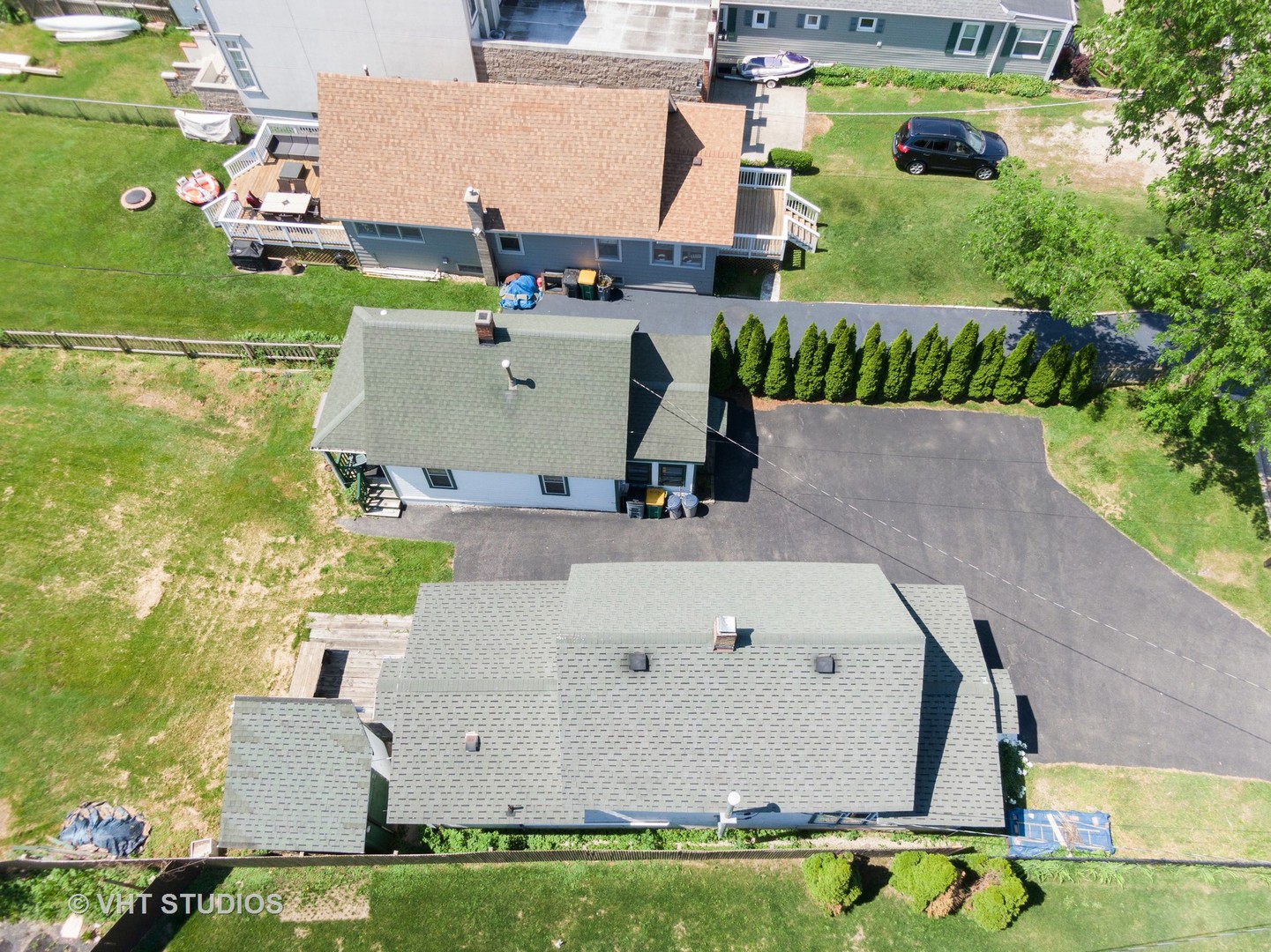 168 Eagle Point Road Fox Lake, IL 60020 - Photo 24 of 25 an aerial view of a house with a garden and a swimming pool