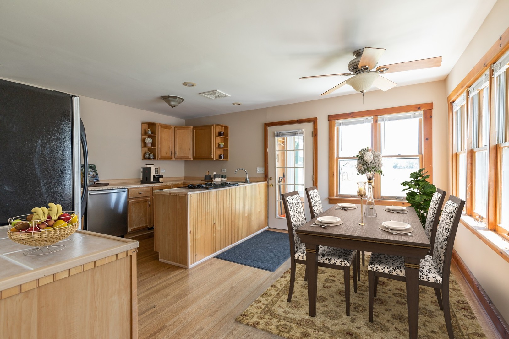 168 Eagle Point Road Fox Lake, IL 60020 - Photo 5 of 25 a view of a dining room with furniture window and wooden floor