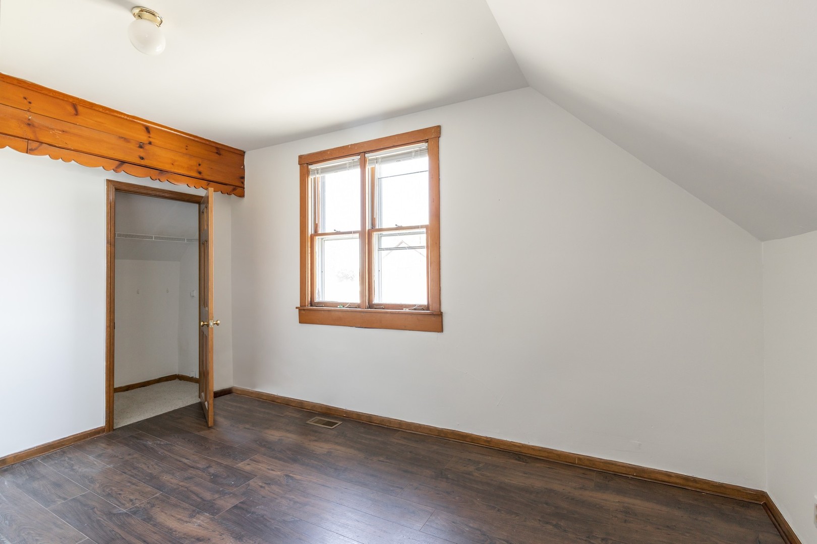 168 Eagle Point Road Fox Lake, IL 60020 - Photo 8 of 25 an empty room with wooden floor and windows