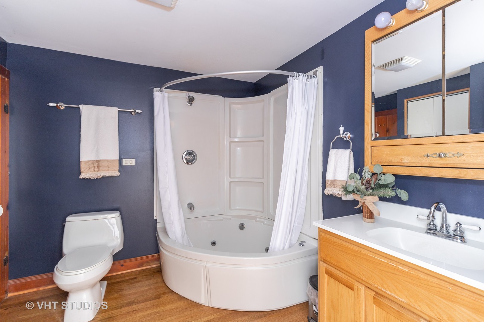 168 Eagle Point Road Fox Lake, IL 60020 - Photo 9 of 25 a bathroom with a sink toilet and shower