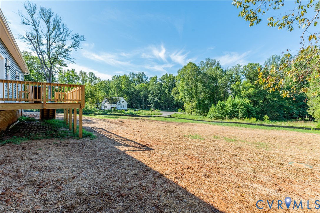 1393 Broad St Road Oilville, VA 23129 - Photo 35 of 39 View of yard featuring a deck