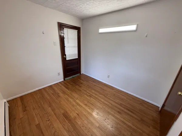 a kitchen with stainless steel appliances a refrigerator stove a sink and a microwave