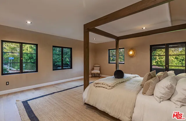 a bathroom with a toilet a sink and bathtub