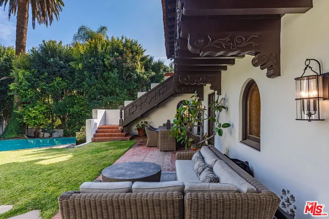 a view of a swimming pool with a patio