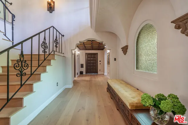 a view of entryway with wooden floor