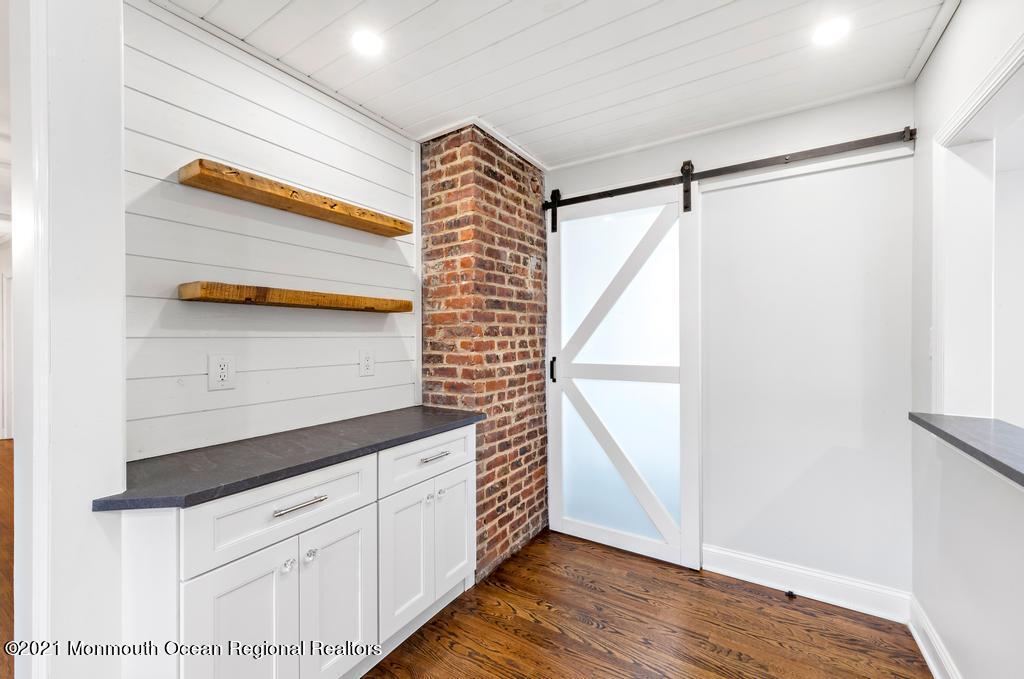495 Branch Avenue Little Silver, NJ 07739 - Photo 11 of 26 a view of walk in closet with hardwood floor
