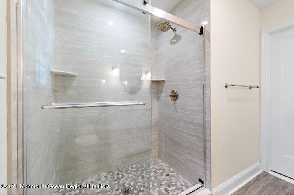 495 Branch Avenue Little Silver, NJ 07739 - Photo 20 of 26 a bathroom with a shower