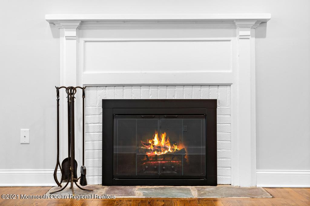 495 Branch Avenue Little Silver, NJ 07739 - Photo 5 of 26 a living room with a fireplace