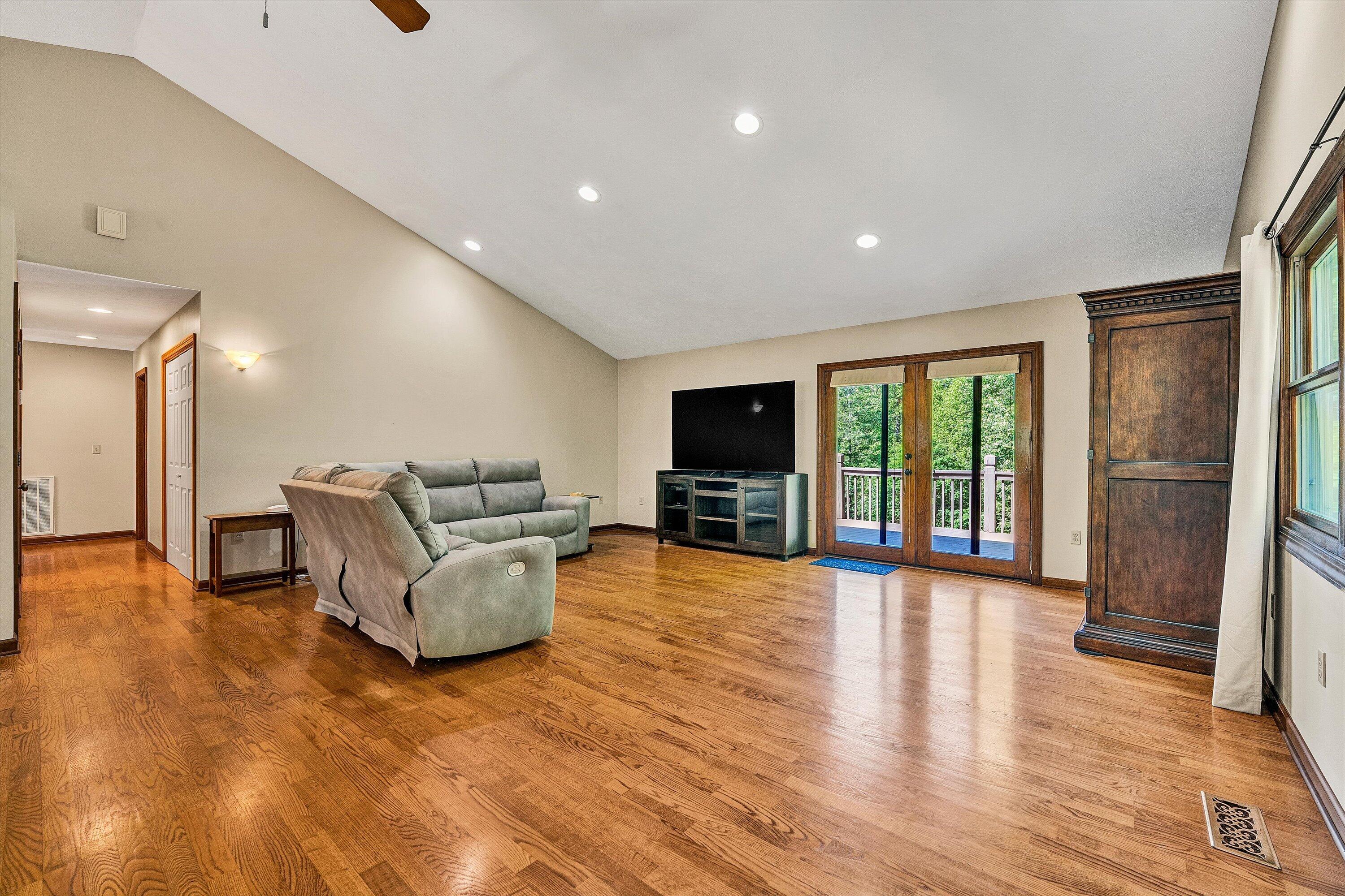 400 Harbor Moneta, VA 24121 - Photo 10 of 51 a living room with furniture and a flat screen tv