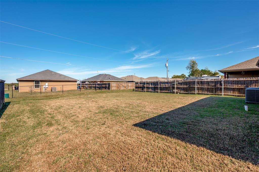 508 Copenhavr Street Pilot Point, TX 76258 - Photo 24 of 25 a view of a house with garden space