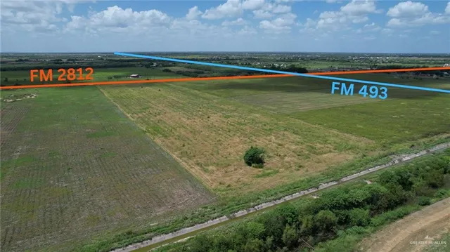 a view of a yard covered with snow