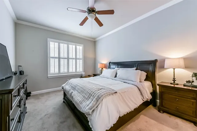 a spacious bathroom with a double vanity sink a mirror and a shower