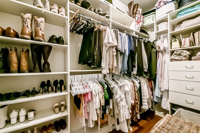 a view of a porch with a table and chairs